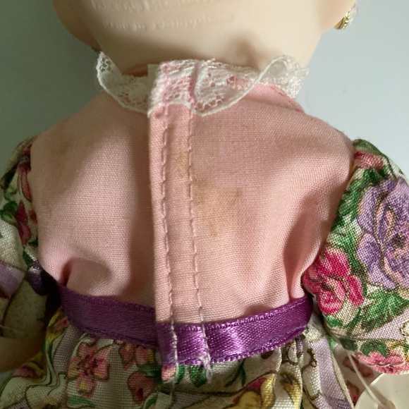 Vintage Precious Moment cute girl . April. 2000,stain on dress.
9” - Picture 5 of 7